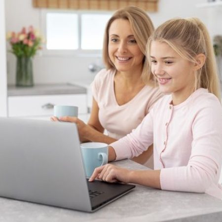 Free-Photo-_-Mother-and-daughter-working-on-laptop.jpg